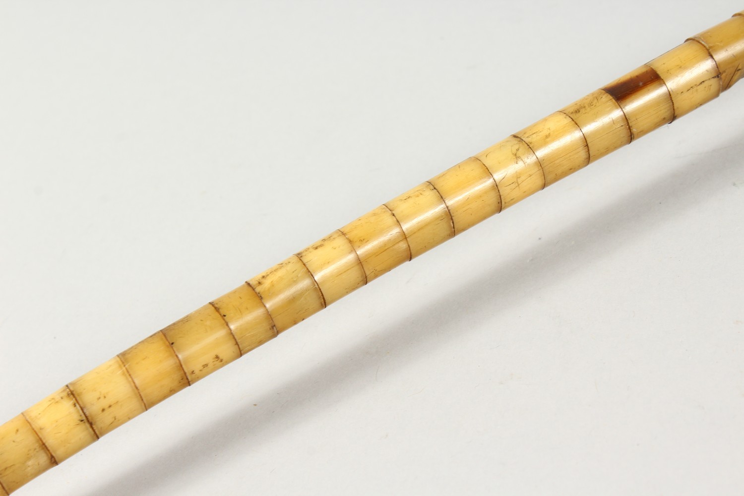 AN UNUSUAL SEGMENTED BONE WALKING STICK. 2ft 10ins long. - Image 10 of 13