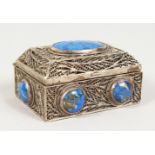 A RUSSIAN SILVER, FILIGREE AND LAPIS BOX. 3ins long.