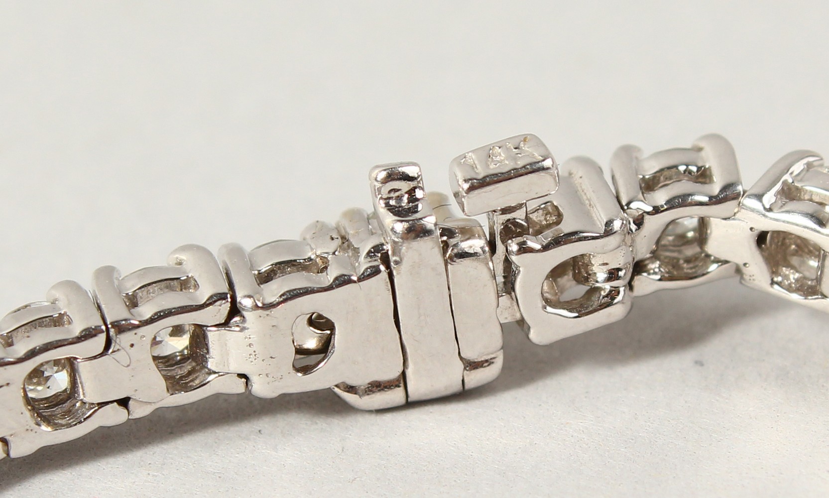 AN 18CT WHITE GOLD DIAMOND LINE BRACELET, with forty-nine diamonds, approx. 6CTS, G/H Colour, V1- - Image 13 of 19