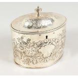 A GEORGE III OVAL TEA CADDY, the cover with urn finial and allover embossed decoration. London 1786.