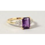 A 9CT GOLD EMERALD CUT AMETHYST AND DIAMOND RING.