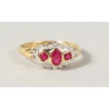 A 9CT GOLD, RUBY AND DIAMOND RING.