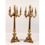 A GOOD LARGE PAIR OF CLASSICAL STYLE TABLE LAMPS, each with five scrolling branches on cluster