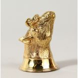 A GOLD PLATED HORSES HEAD SEAL.