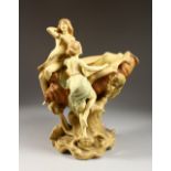 A ROYAL DUX STYLE SHELL VASE with two young girls. 15ins high.
