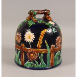 A MAJOLICA STYLE CHEESE DISH COVER. 10ins high.
