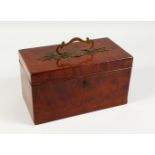 A GEORGE III MAHOGANY TEA CADDY, with brass carrying handle and three division interior with tins.