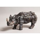 A COLD PAINTED BRONZE RHINOCEROS INKWELL. 6.5ins long.