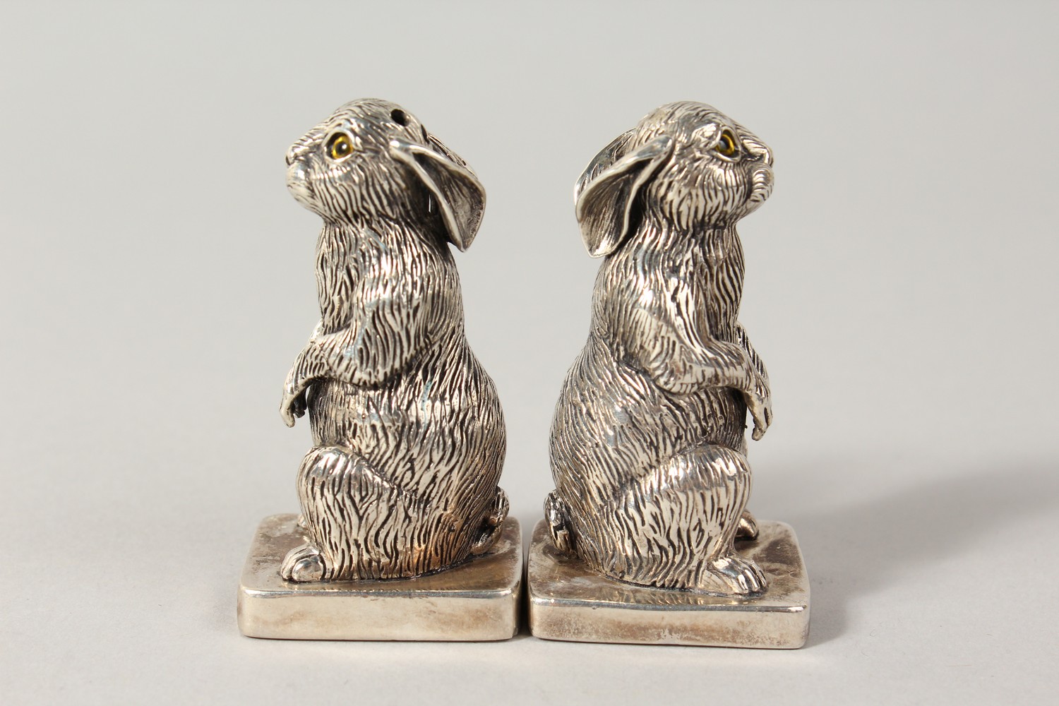 A GOOD PAIR OF HEAVY CAST SILVER SEATED RABBIT SALT AND PEPPERS. 2.25ins high. - Image 4 of 6