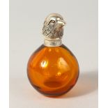 A SMALL SILVER TOP BIRD GLASS SCENT BOTTLE.