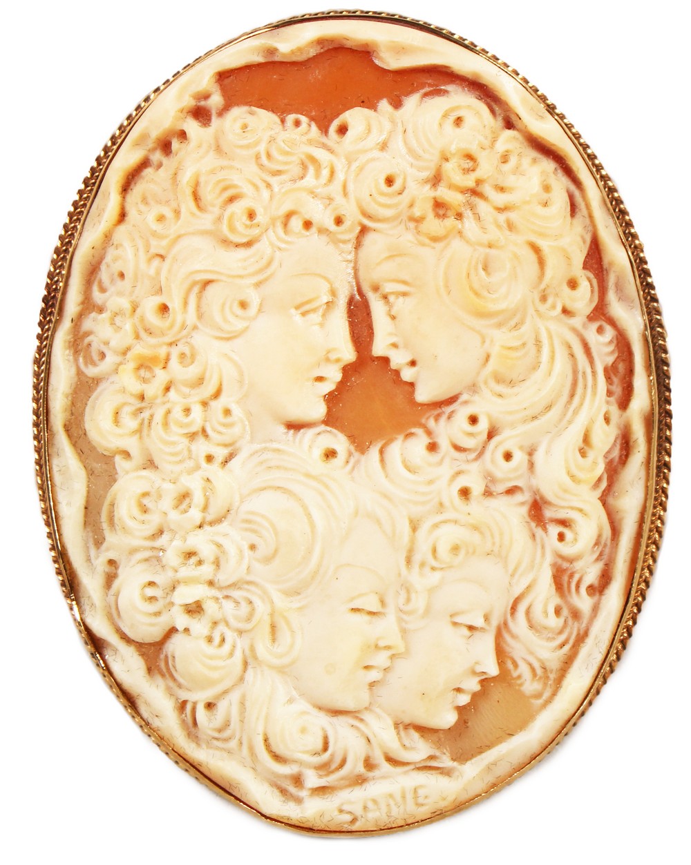A GOOD VICTORIAN GOLD MOUNTED CAMEO BROOCH, carved with the busts of four young ladies. 2.5ins x