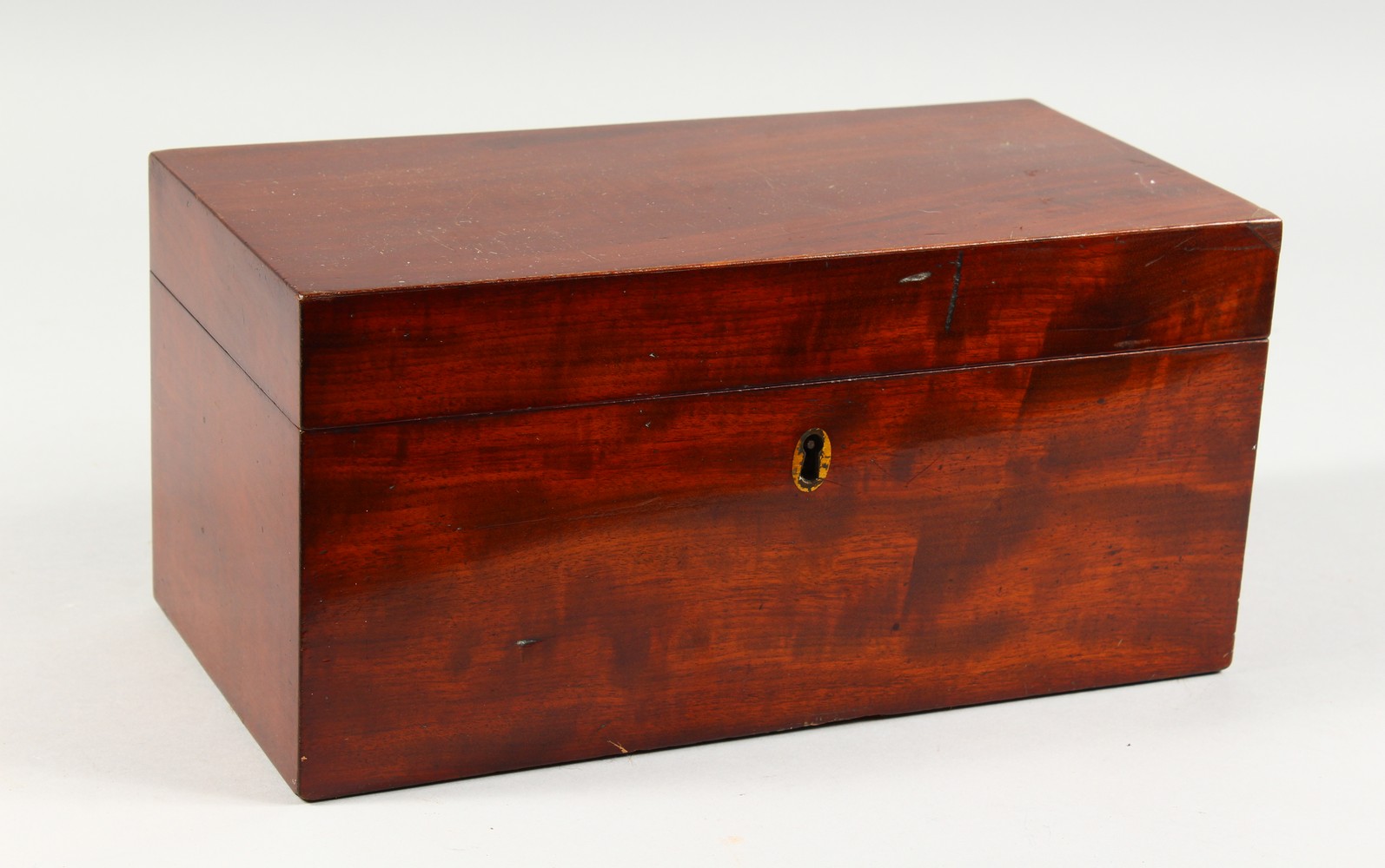 A 19TH CENTURY MAHOGANY RECTANGULAR TEA CADDY. 12ins wide.