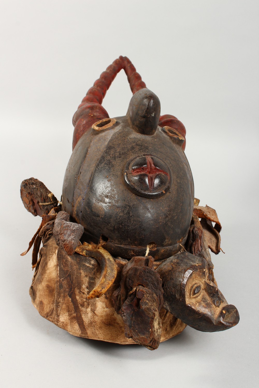 A GOOD CARVED AND PAINTED WOOD MASK, with red painted horns, and symbolic devices hung around the - Image 4 of 6