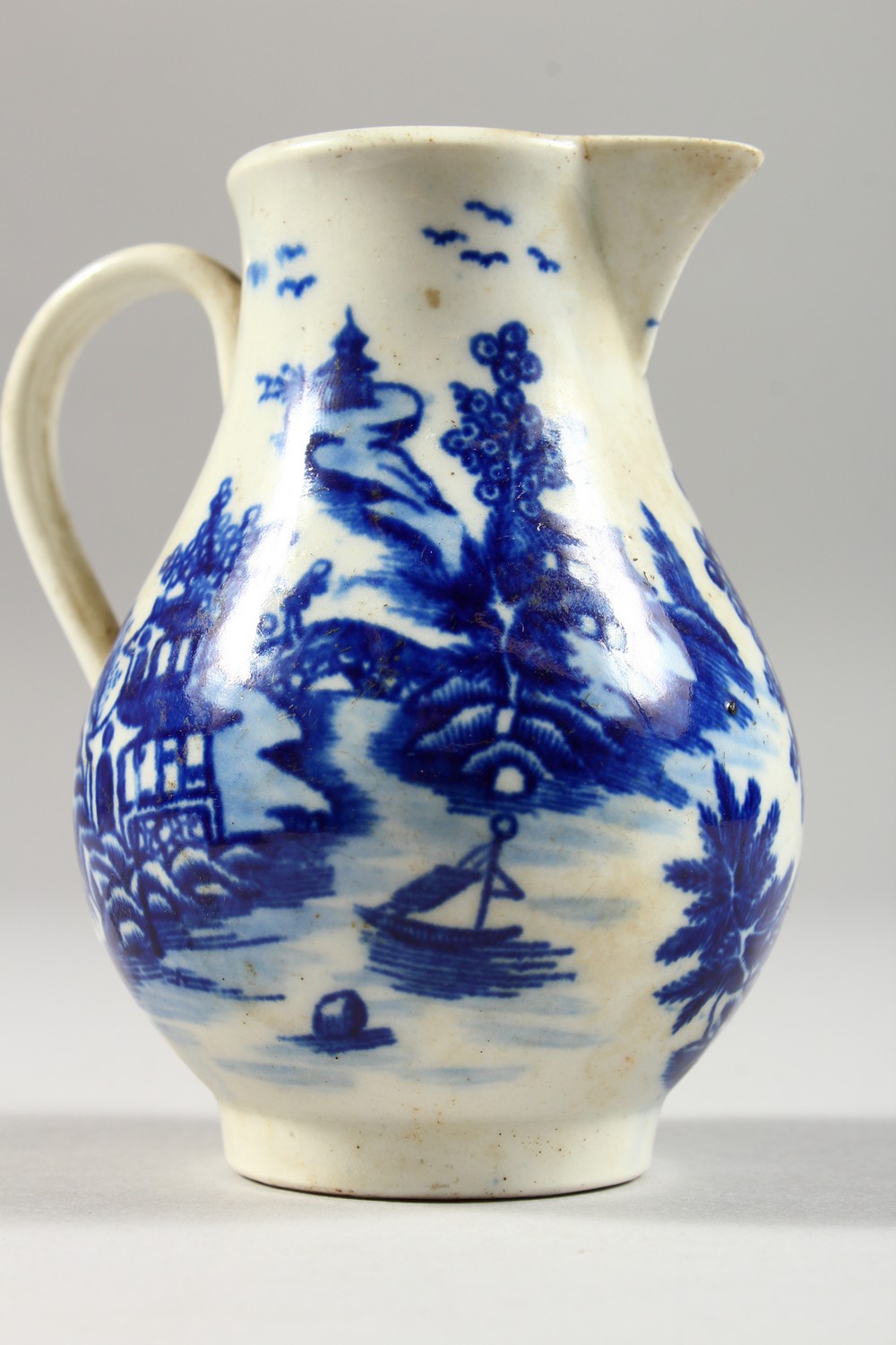 A WILLOW PATTERN DESIGN SPARROW BEAK JUG. 3.5ins high. - Image 5 of 11