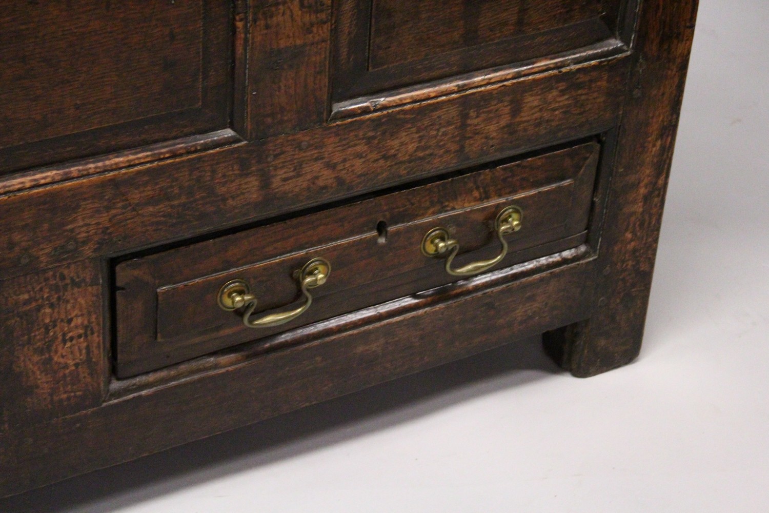 AN 18TH CENTURY OAK COFFER BACH, with rising top, panelled front and two drawers, on stile feet. 4ft - Image 2 of 10