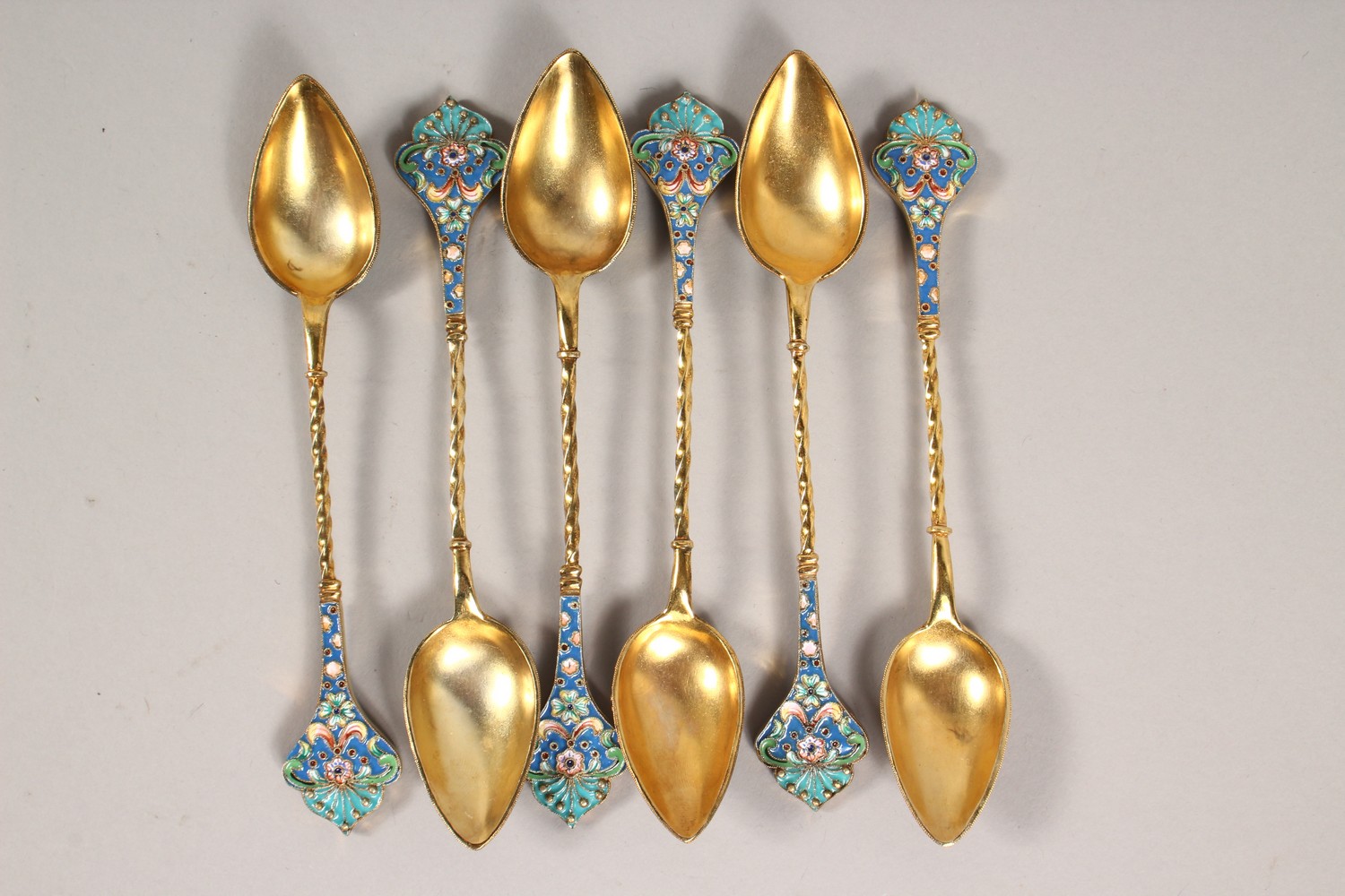 A SET OF SIX RUSSIAN SILVER AND ENAMEL TEASPOONS. 6ins long. - Image 4 of 4