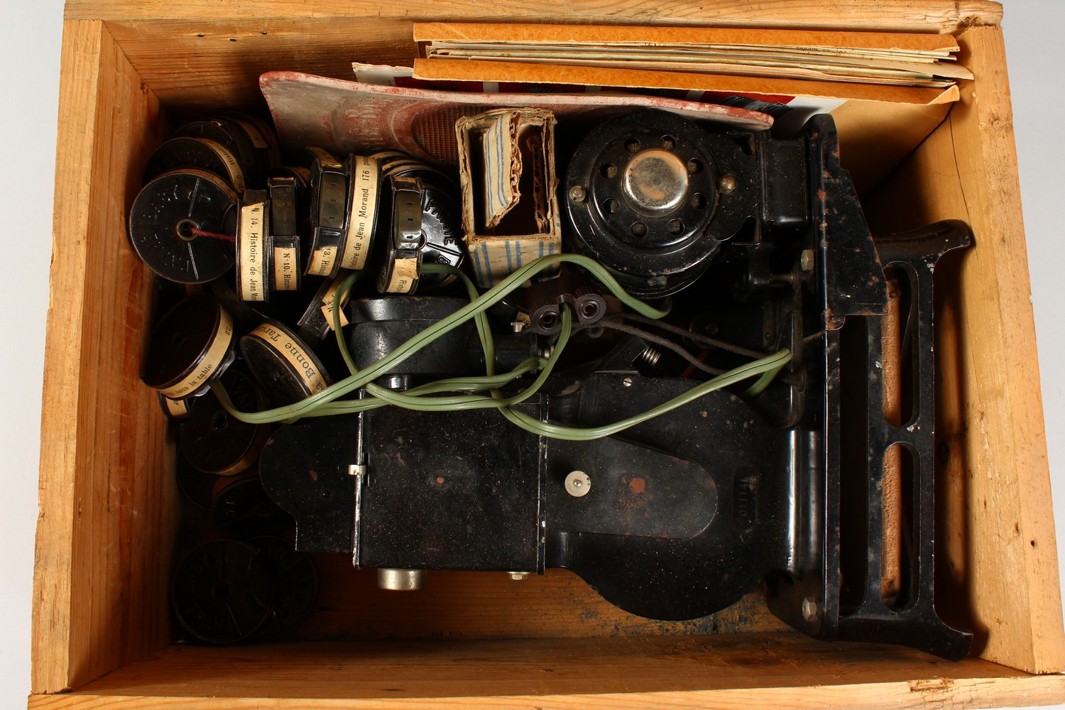 AN EARLY ELECTRIC FILM PROJECTOR, with a quantity of film rolls. - Image 3 of 4