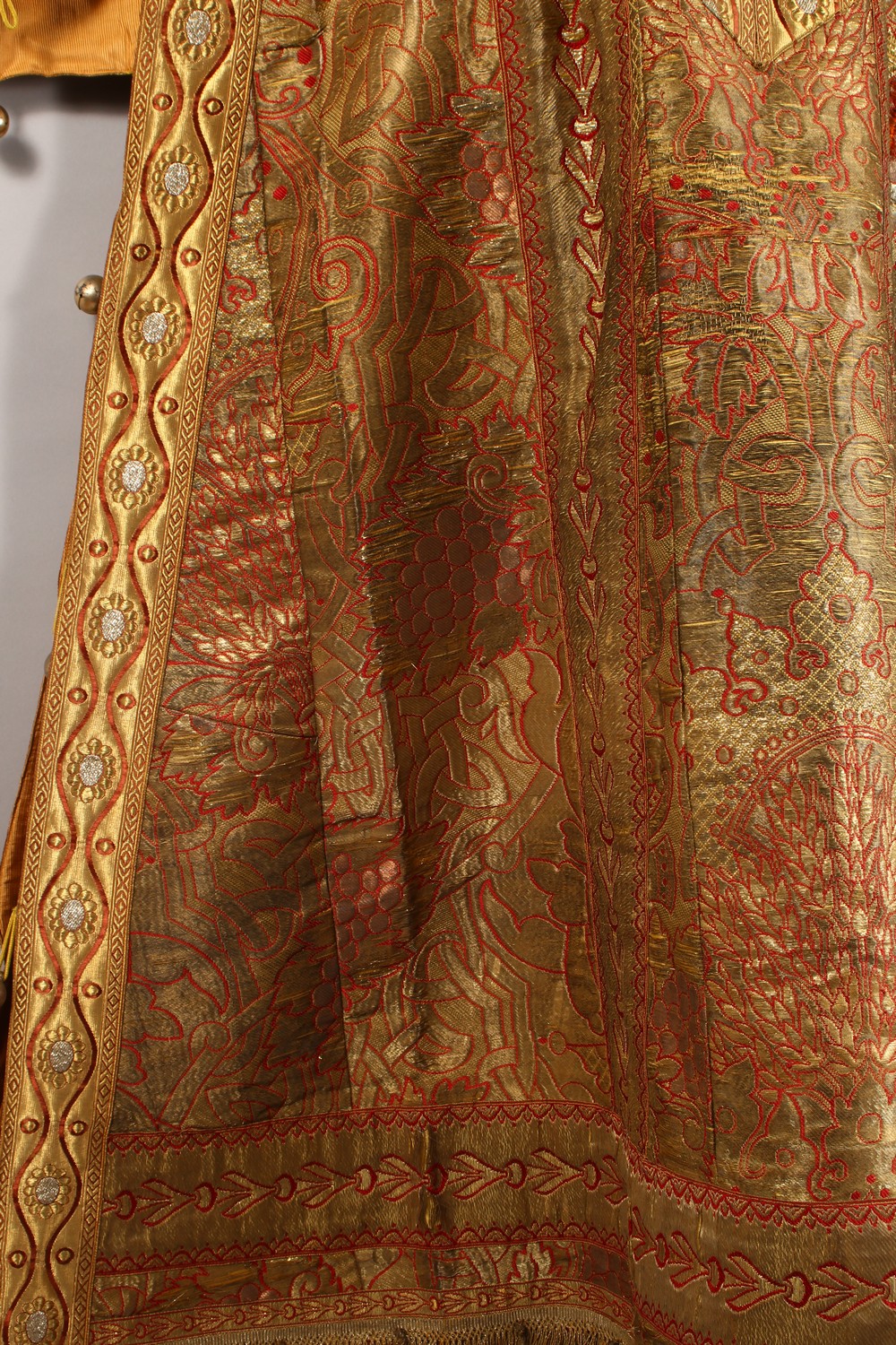 AN UNUSUAL EARLY 20TH CENTURY RUSSIAN COAT, with highly ornate gold thread embroidered decoration, - Image 9 of 22