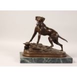 AN AMUSING BRONZE OF A DOG CHASING A RABBIT DOWN A RABBIT HOLE, on a rectangular marble base. 11.