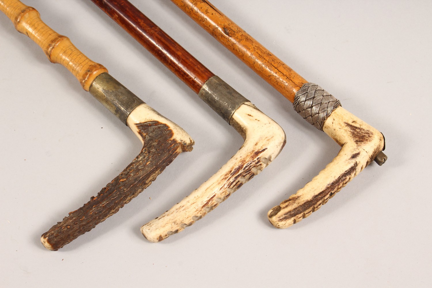 THREE ANTLER HANDLED RIDING CROPS. - Image 2 of 5