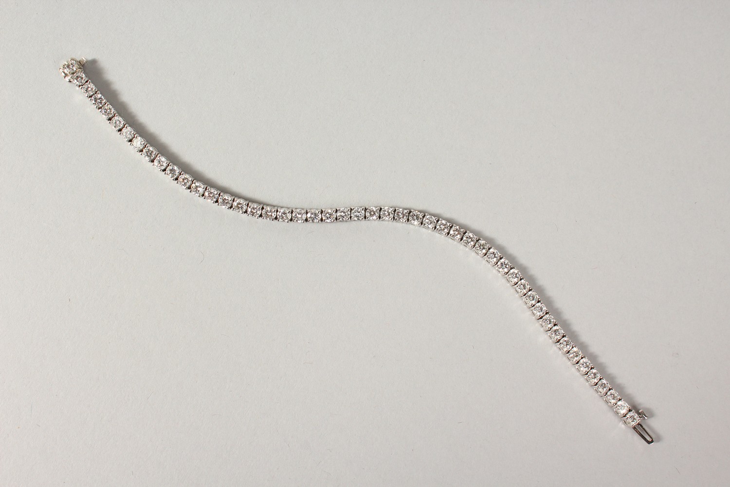 AN 18CT WHITE GOLD DIAMOND LINE BRACELET, with forty-nine diamonds, approx. 6CTS, G/H Colour, V1- - Image 3 of 19