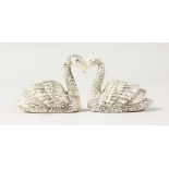 A GOOD PAIR OF HEAVY NOVELTY SILVER PLATE SWAN SALT AND PEPPERS. 1.5ins high.