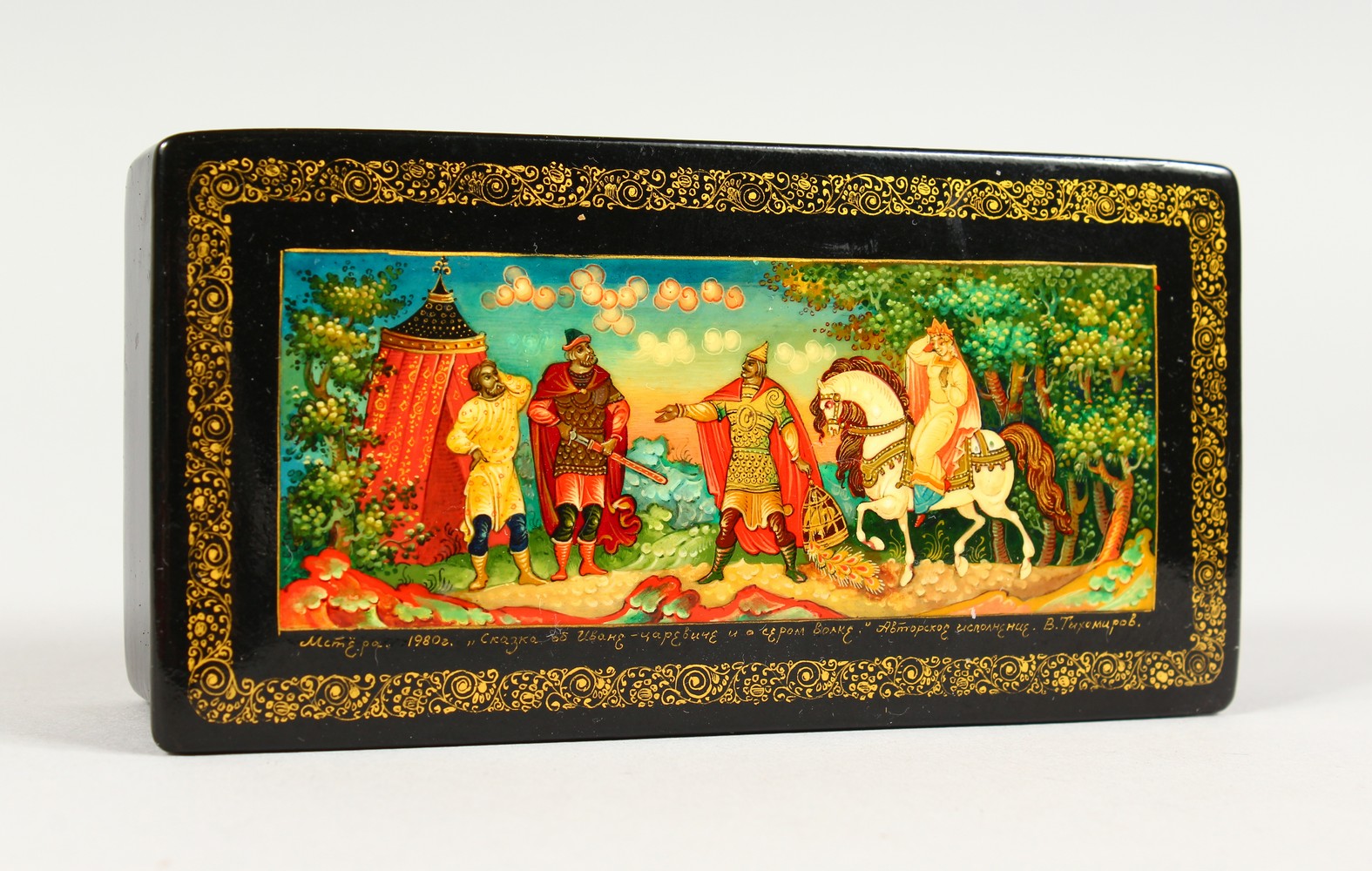 A RUSSIAN BLACK PAPIER MACHE BOX, "Knight and Lady on Horseback", in original cardboard box. 4.