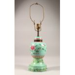 A CHINESE TURQUOISE GROUND GINGER JAR AND COVER, on later wooden base, converted to a lamp. 18ins