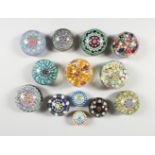 A COLLECTION OF THIRTEEN MILLEFIORI PAPERWEIGHTS. 3ins diameter and smaller.