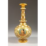 AN INDIAN PAINTED AND GILDED ALABASTER WATER BOTTLE. 9.75ins high.