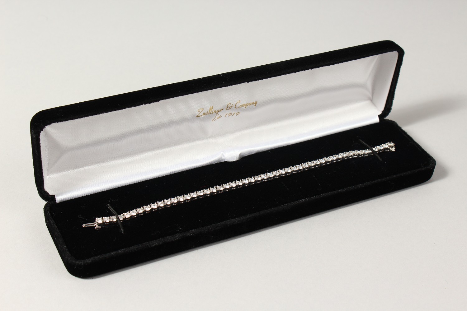 AN 18CT WHITE GOLD DIAMOND LINE BRACELET, with forty-nine diamonds, approx. 6CTS, G/H Colour, V1- - Image 15 of 19