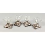 FOUR CONTINENTAL SILVER AND CUT GLASS SALTS. 3.25ins high.