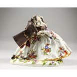 A GOOD LARGE MEISSEN FIGURE GROUP OF A GALLANT AND LADY, in a romantic embrace, the lady with a