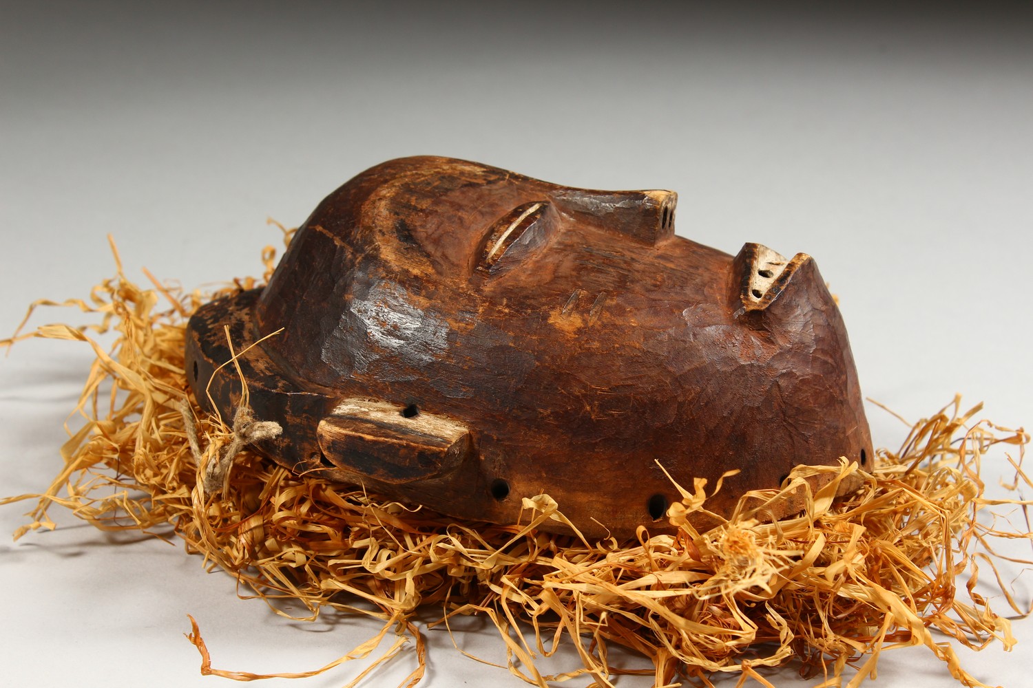 A CARVED WOOD TRIBAL MASK "TSHOKWE LWENA SHABA". 7.5ins high. - Image 2 of 5