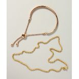 A 9CT GOLD BRACELET AND CHAIN, 22gms.