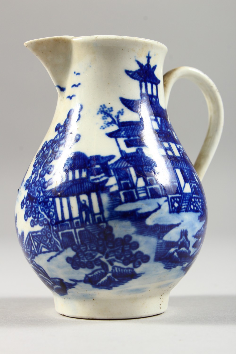 A WILLOW PATTERN DESIGN SPARROW BEAK JUG. 3.5ins high. - Image 2 of 11