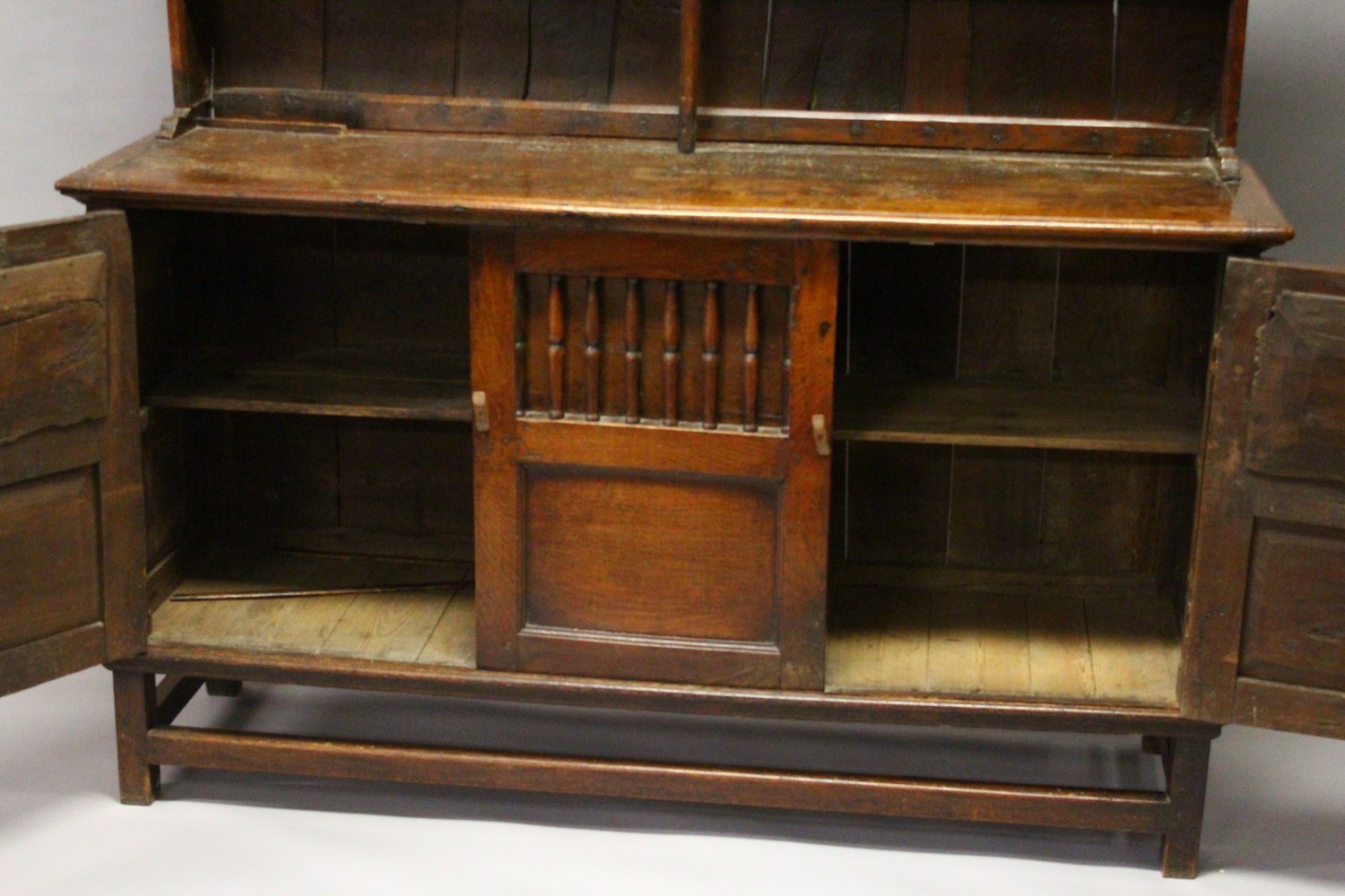 AN 18TH CENTURY OAK DRESSER, with a double Delft rack, the base with three cupboard doors, each part - Image 2 of 6