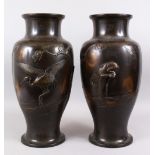 A PAIR OF LARGE JAPANESE MEIJI PERIOD BRONZE CRANE VASES, the large baluster shaped bronze vases
