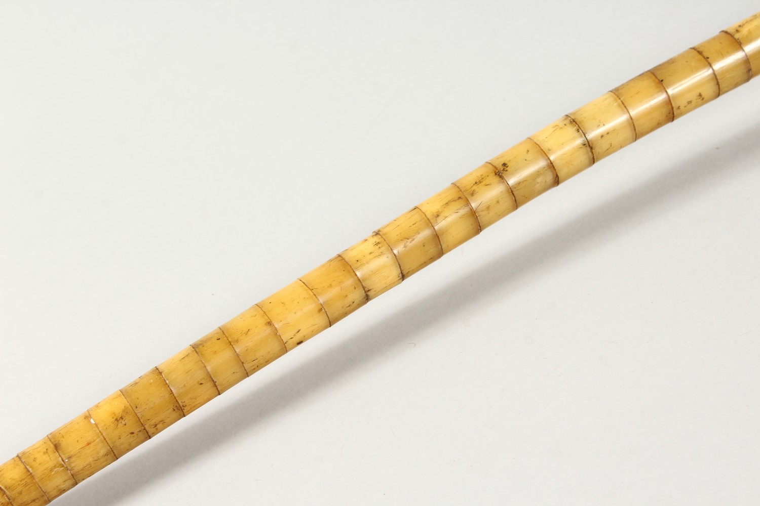 AN UNUSUAL SEGMENTED BONE WALKING STICK. 2ft 10ins long. - Image 11 of 13