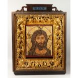 A LARGE 19TH CENTURY MOSAIC PORTRAIT, Head of Christ, 15ins x 13ins, in a 19th century Italian