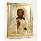 A RUSSIAN ICON, with silver gilt overlay. Maker: M.H. 8.5ins x 7ins.