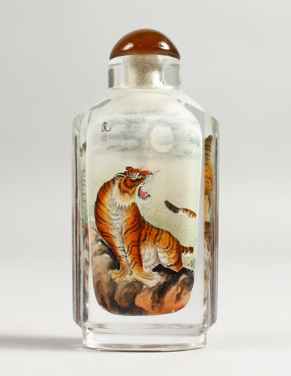 A GOOD SNUFF BOTTLE painted with tigers, 9.5cm.