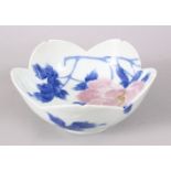 A GOOD JAPANESE MEIJI PERIOD BLUE & WHITE LEAF FORMED BOWL, decorated with blue & pink floral