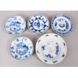 A SET OF 5 GOOD KANGXI PERIOD CHINESE BLUE & WHITE PORCELAIN SAUCERS, each decorated with scenes