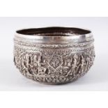 A FINE 19TH CENTURY BURMESE SOLID SILVER BOWL, the bowl with an array of pressed figure and formal