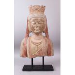 A 19TH / 20TH CENTURY SANDSTONE BUST OF BUDDHA wearing a headdress, with polychrome decoration, on
