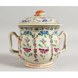 A TWIN HANDLED CHINESE 19TH / 20TH CENTURY FAMILLE ROSE BOWL AND COVER. 4ins diameter.
