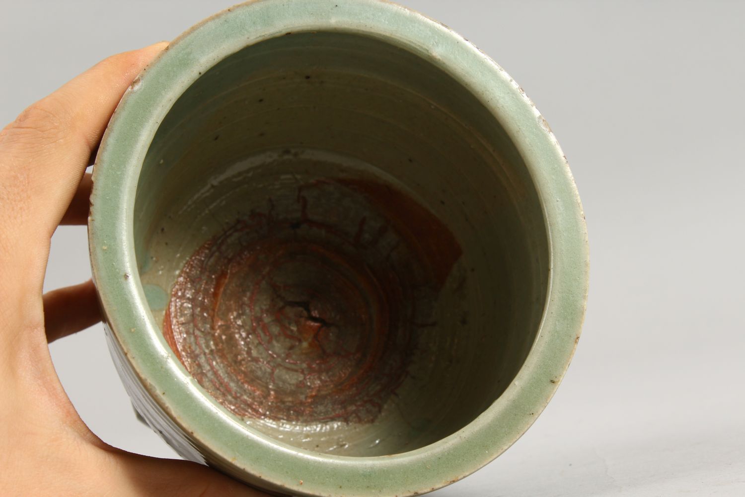 AN EARLY CHINESE LONGQUAN CELADON CIRCULAR CELADON CENSER on three legs. 5.5ins diameter. - Image 7 of 7