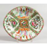 A 19TH CENTURY CHINESE CANTON PORCELAIN OVAL DISH with four panels of birds, butterflies and