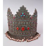 A LARGE AND FINE 19TH CENTURY PERSIAN OR TURKMEN TURQUOISE & SILVER CEREMONIAL BRIDAL CROWN, the
